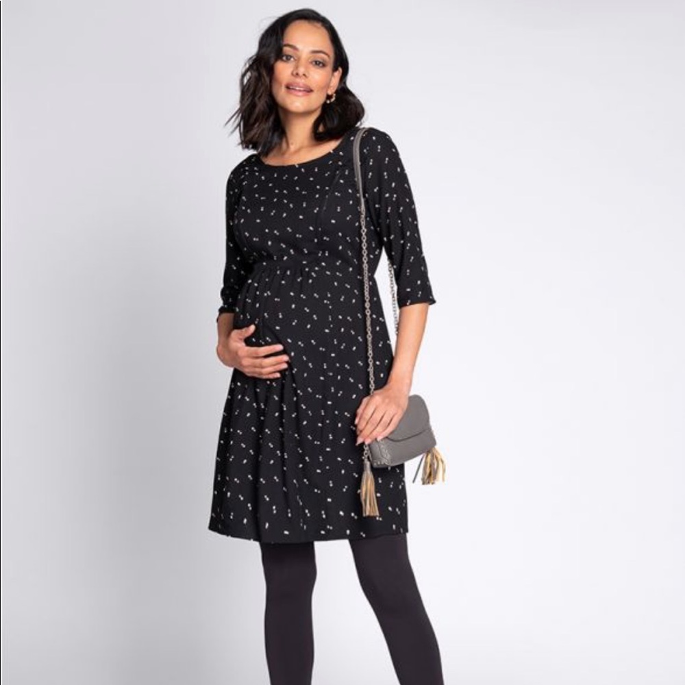 Never worn maternity/nursing dress. Black with small polka dots.